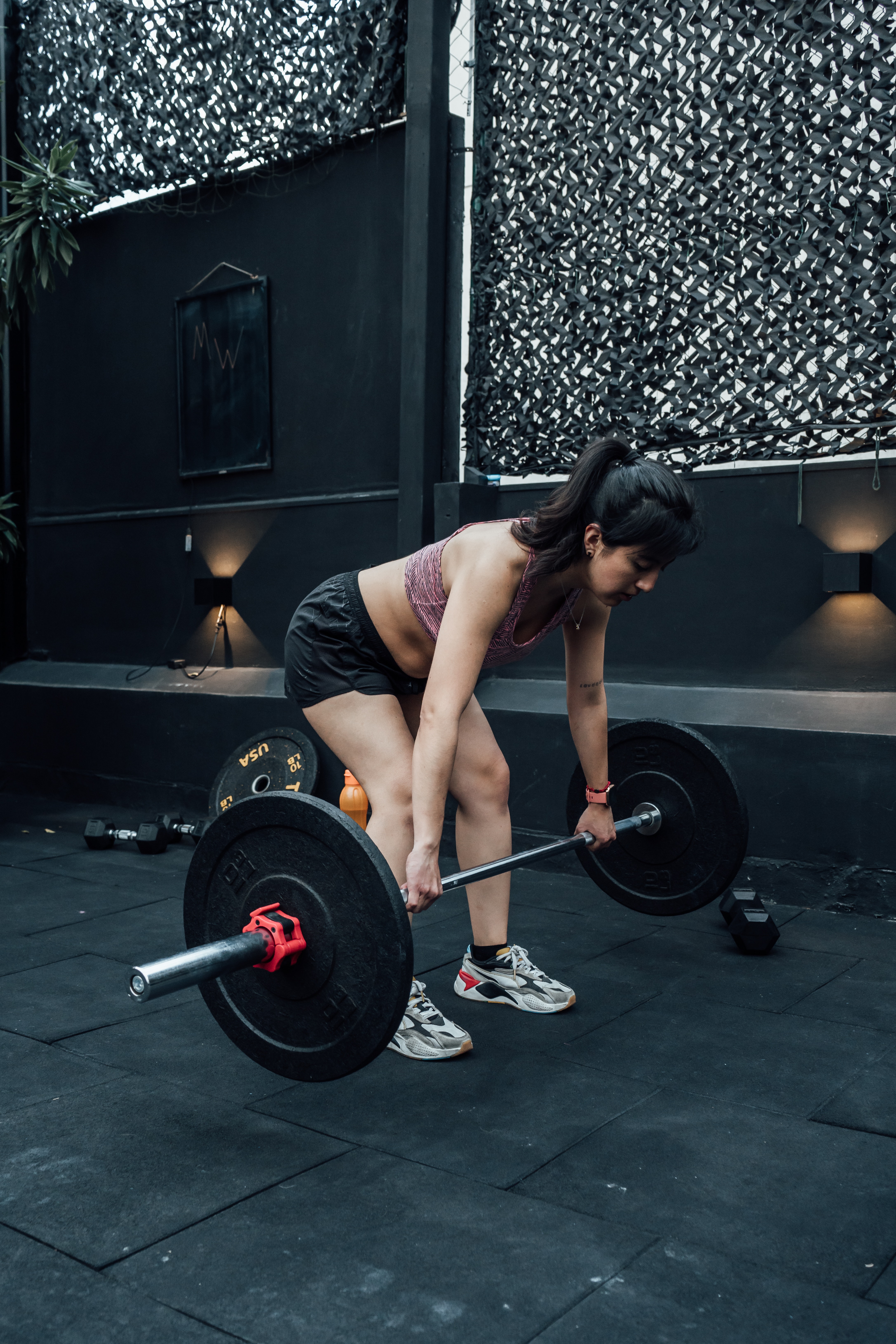 a woman performing a row