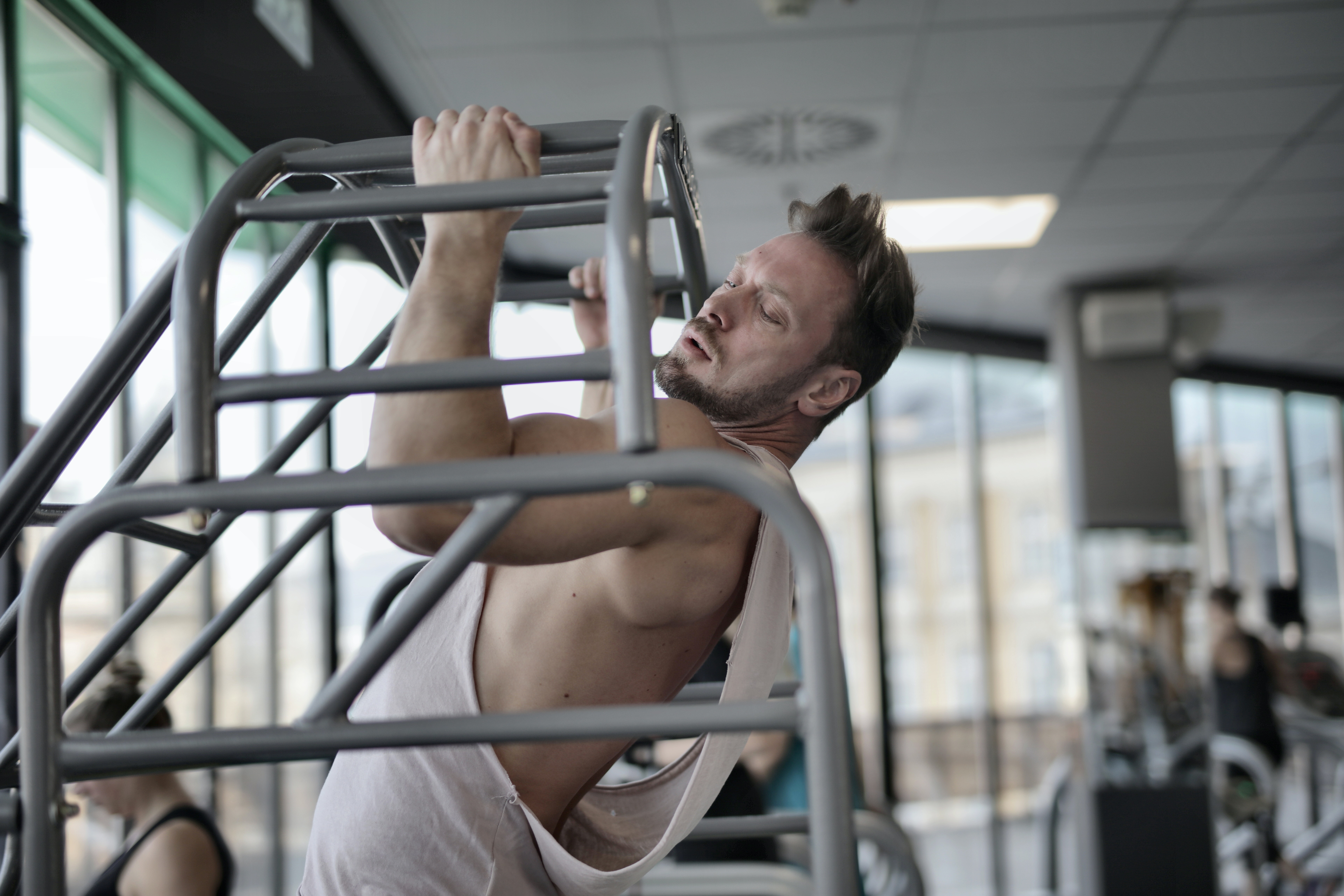 a man performing a pull up